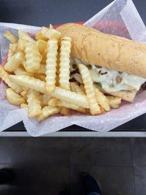 Philly cheese steak and crinkle cut fries