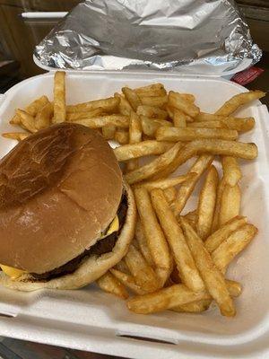 Hamburger with cheese and fries.