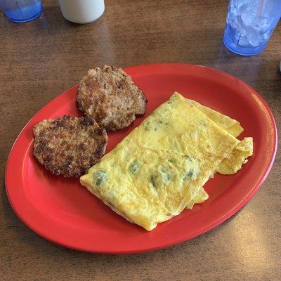 Sausage patties and spinach and Swiss omelette.