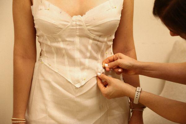 Fitting of the pattern of a custom made dress