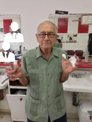 My favorite Braes Heights Barber Shop barber: Phil! Here he is ready to give me an old fashioned shave!