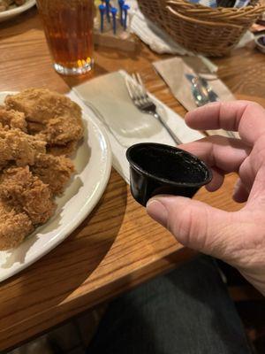 $.50 apple butter cup that was half full. Enough for one biscuit