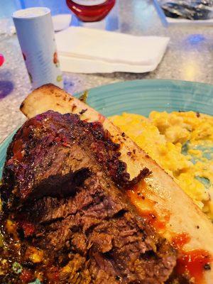 Smoked short rib with mashed potatoes topped with Jalapeño creamed corn