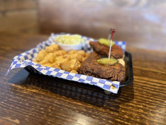 BIG DARK w queso SMOTHERED TOTS and COLE SLAW