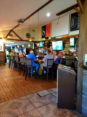 Jan 2022: Interior Pic 14 of 22-- facing the central bar. The pool tables are straight ahead