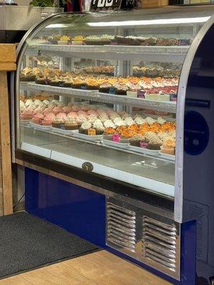 Yummy cupcakes and desserts in their display case!