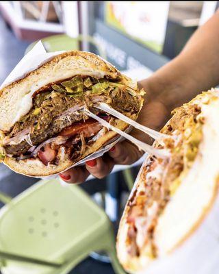 La Cubana Torta with Milanesa Birria Ham lettuce tomato panela cheese mozzarella jalapeños avocado mustard mayo