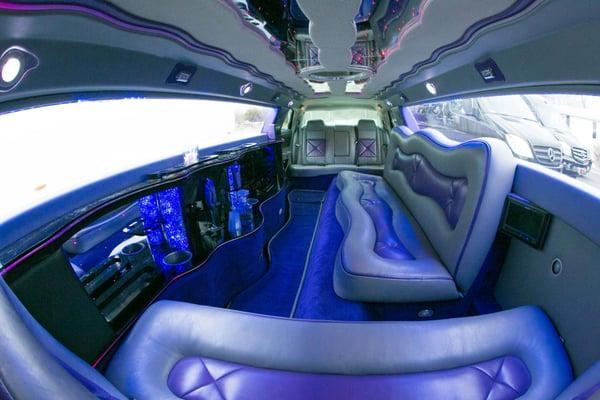 interior of Chrysler 300 exotic limo w/purple rain interior