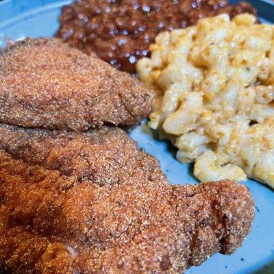 Catfish dinner with beans and Mac and cheese