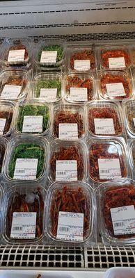 Lots of banchan (seaweed salad, pickled radish etc)