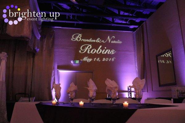 Beautiful purple uplighting at the Uptown Ballroom. Uplighting + Monogram by Brighten Up Event Lighting www.brightenuplighting.com