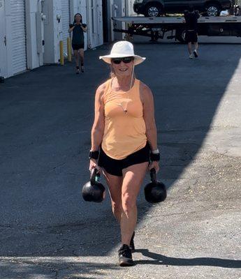 Kimmie carrying the KBs...strong at all ages...she is impressive!