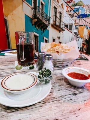 Queso with a side of Jalepenos, salsa, and chips