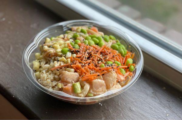 Regular Build Your Own Bowl with brown rice, salmon, albacore, edamame, corn, and pickled carrots