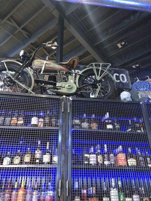 Motorcycle decor above booze locker