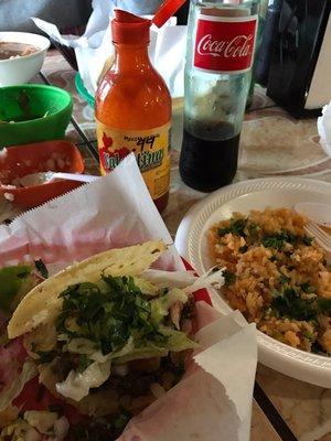 Gorditas, rice, bottled Mexican coke.  Always fresh salsa and chips comes w every order.