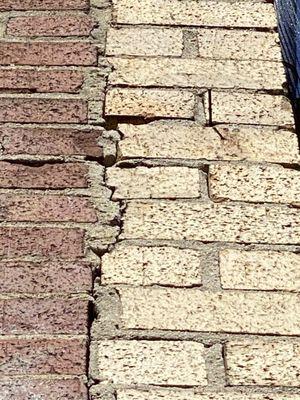 This is the rear boiler flume. The crack is the facade, they had their architect lie and say it was safe. They don't care.