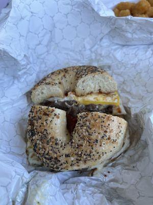 Everything bagel sandwich with steak, egg and cheese