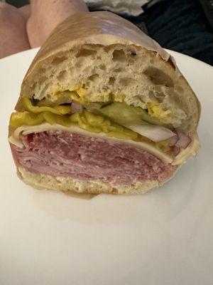 My ham, salami & Swiss on a ciabatta roll. Mustard, mayonnaise peppercini, red onions and pickles....Delicious!!!