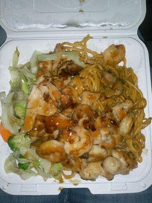 Shrimp and chicken with veggies and noodles