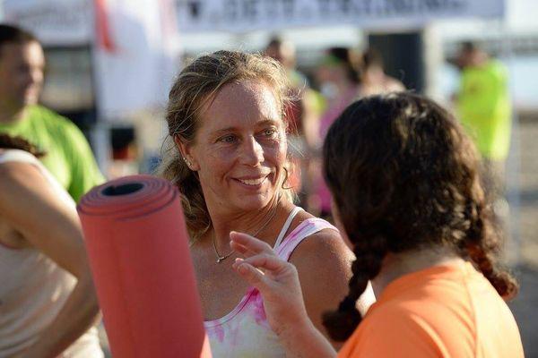 Owner Mary E. Wright after leading a Sunrise Beach Yoga Class