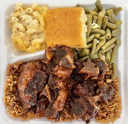 Oxtail, Mac n cheese, beans, Cornbread & rice