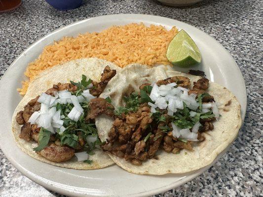 Pastor tacos and rice