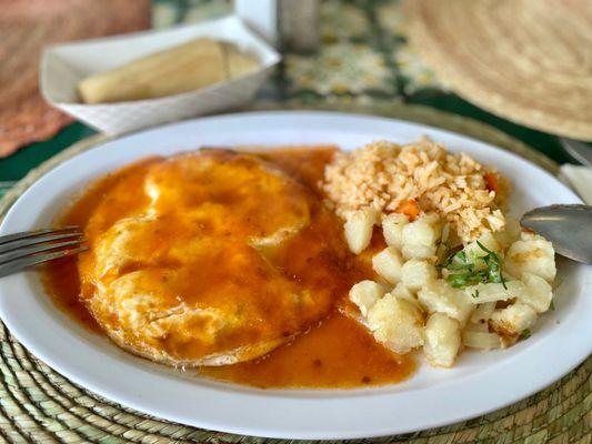 Huevos Rancheros with side of rice & potatoes