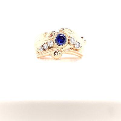 Natural blue spinel and diamond ring in 18 karat Peach gold