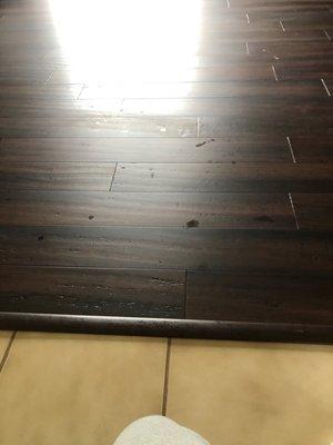 Bamboo flooring with the spots on it