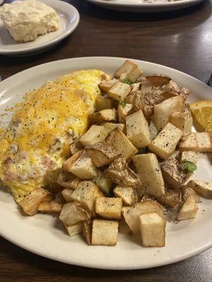 Ham and cheese omelet with home fries!