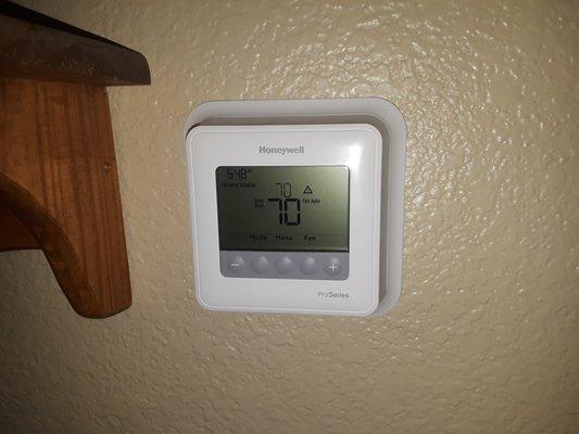 Honeywell T-4 Programmable Thermostat.