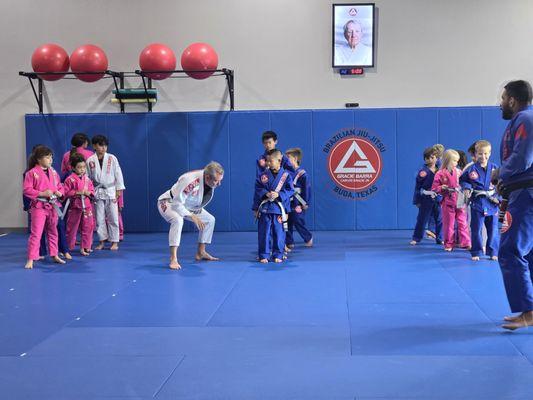 Two black belts running the class, one of which is ni-dan(2nd stripe)