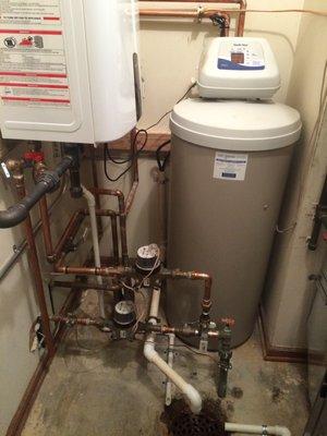 We removed the tank style water heater to install a Navien tank-less water heater. We installed a new NorthStar water softener