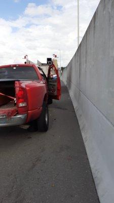 Fire truck in front of the red truck. Cement barrier was dangerous. Curtis rescued us and saved the day.