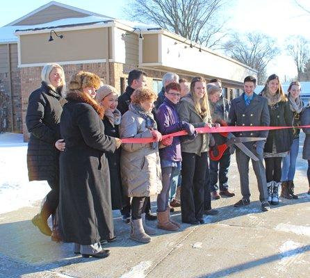 "back to you" ribbon cutting