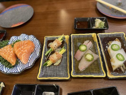 Salmon, apps selection from sushi bar