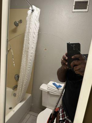 Cracked bathroom mirror