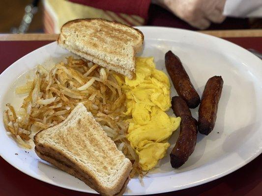 Eggs, sausage link, hashbrowns, and white toast