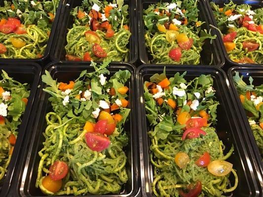 Kelp and zucchini pesto pasta with arugula salad and almond ricotta