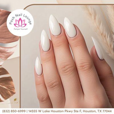 These elegant almond nails boast a soft, sheer polish that lets the natural beauty of your nails shine through. The perfect balance of class