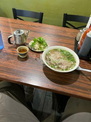 Hot tea, and phô with all the usual items