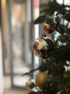 Christmas decor and decorations, silver and gold on a Christmas tree in Brooklyn, NY.