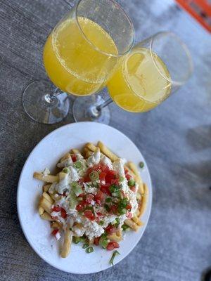 Big boy mimosas, Feta frys, & Pesto caesar salad