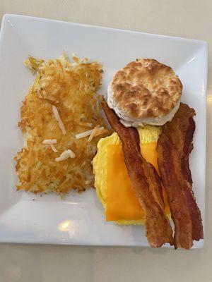 Biscuits and hashbrown. Scrambled eggs and bacon