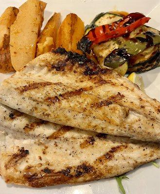 Branzini with lemon potatoes and grilled vegetables