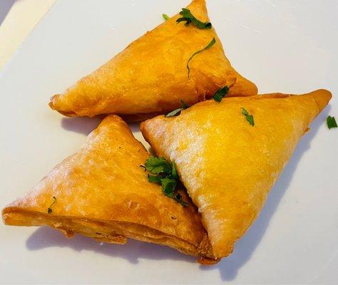 Malai samosas:  crisp and flaky pastry stuffed with sweetened cottage cheese