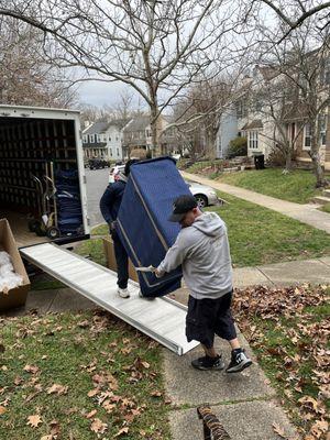 Dresser wrapped safely and carried up the stairs