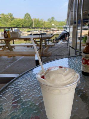 Piña colada overlooking marina.