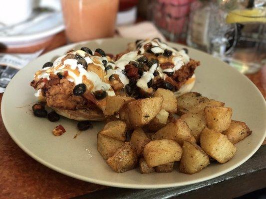 Eggs Benedict w/ fried chicken, black bean salsa, and cilantro cream sauce